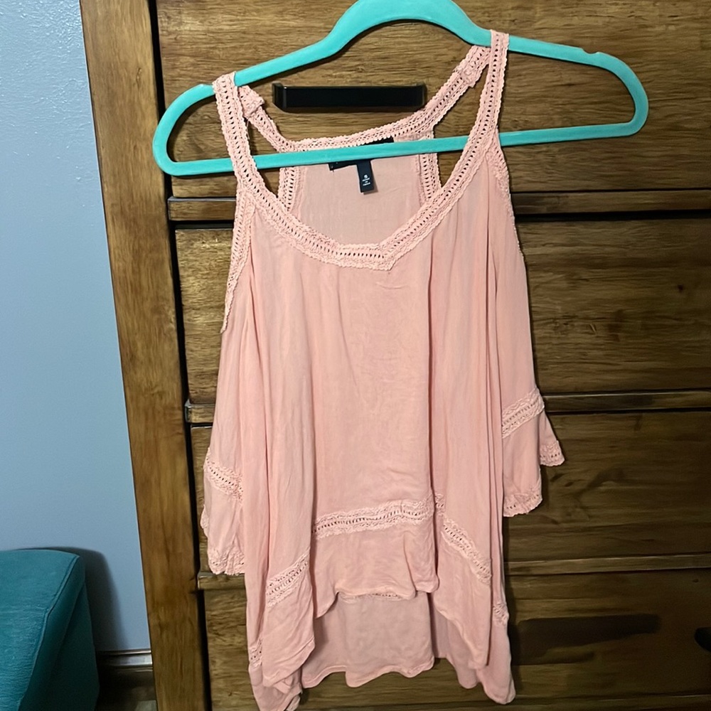 Tank top with sleves. Cute design! Flowy.